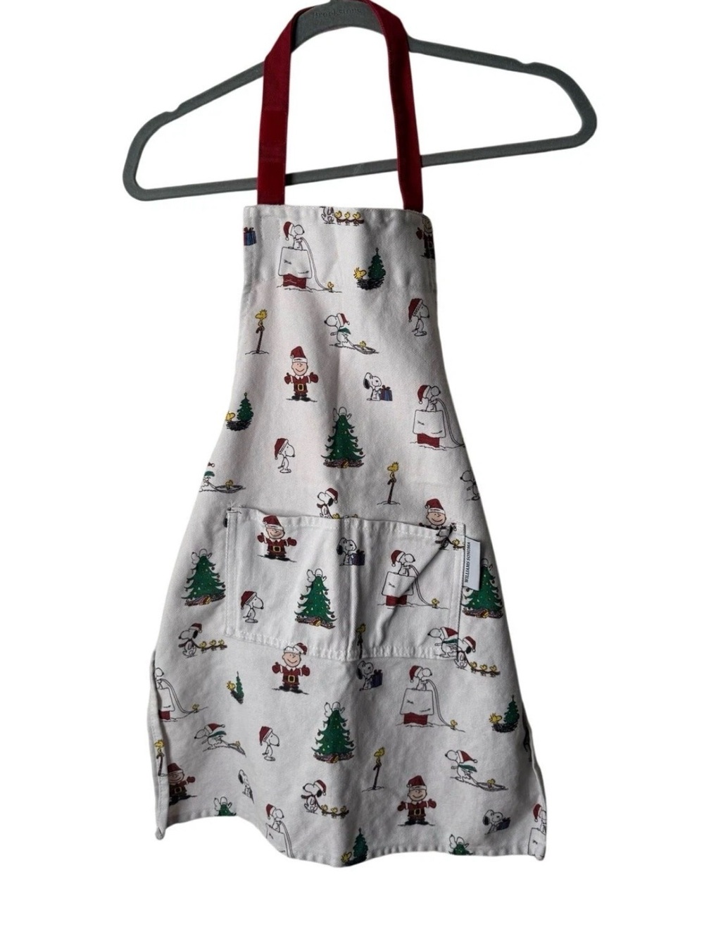William Sonoma festive PEANUTS™ Holiday Apron featuring an all over winter wonde